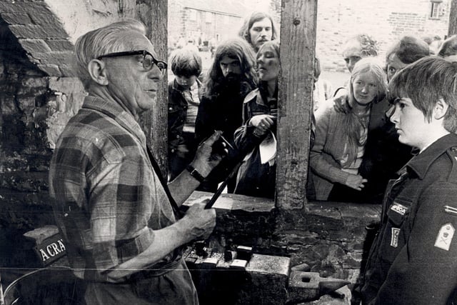 A working day at Abbeydale Industrial Hamlet in May 1973 attracts visitors to watch the skills of the craftsmen