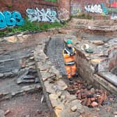 Archaeologist Victoria from Wessex Archaeology working on a rediscovered Victorian gennel on the excavation of Sheffield Castle. Picture: Julia Armstrong, LDRS