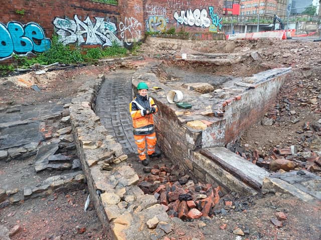Archaeologist Victoria from Wessex Archaeology working on a rediscovered Victorian gennel on the excavation of Sheffield Castle. Picture: Julia Armstrong, LDRS