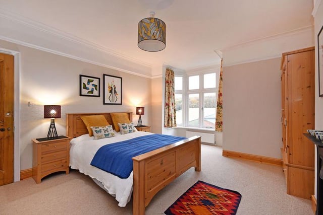 The front master bedroom has a Victorian decorative fire surround and a bay window with views of Endcliffe Park and Hallamshire Tennis Club.