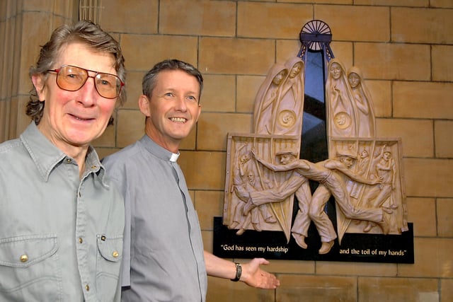 Vicar of Stainforth Andrew Allington (right) and sculptor Byron Howard are pictured with the new miner's memorial sculpture which will dedicated at St Marys Church, Stainforth, by the Bishop of Doncaster in 2010