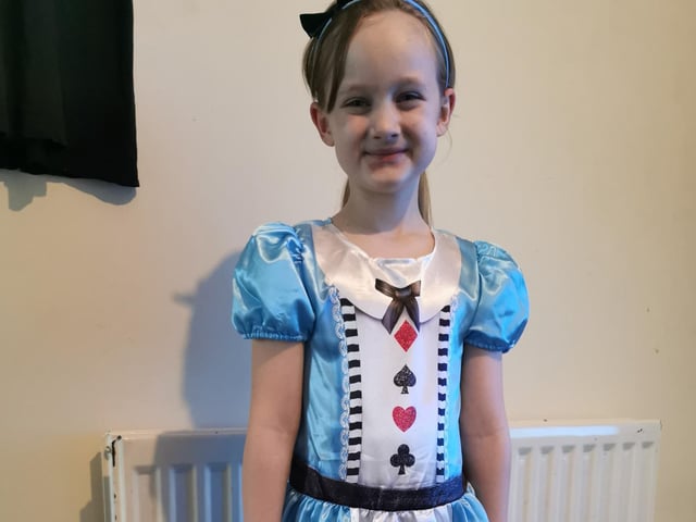 Lacey-Rose, 6, from Gosport, dressed as Alice in Wonderland for World Book Day.