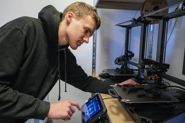Ollie Pope 3D printing components for Aura Flights, which sends people's ashes into space