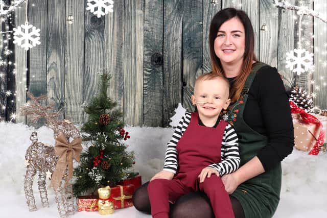 Alfie's 2018 Christmas, as he underwent treatment for stage two cancer, pictured with mum Emma