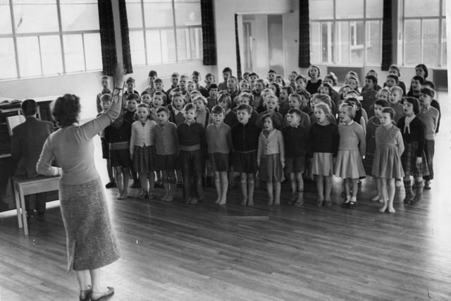 Practising for the big day are pupils of Biddick Hall Junior School Choir, who sang at the official opening of the school in 1958.