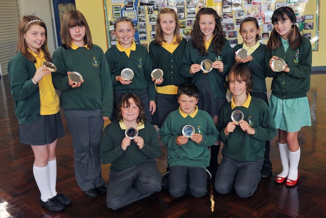 Year 6 pupils at Fens Primary School with their achievement awards 9 years ago. Who can tell us more?