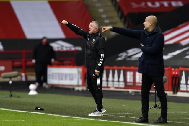 Sheffield United's Chris Wilder and Pep Guardiola of Manchester City: Andrew Yates/Sportimage