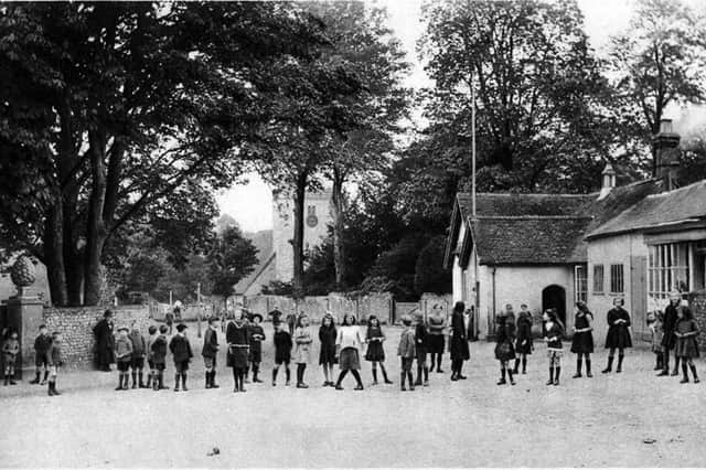 Droxford church and school
Sent in by J.H. Kemp of Lincoln of the village of Droxford between the wars, here we see some carefree pupils at the village school in the heart of the village alongside the church.