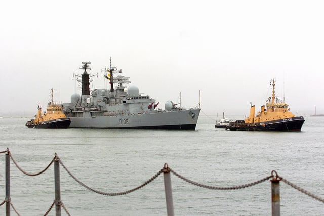 HMS CARDIFF arrives in Portsmouth Naval Base
17th June 2005. Coming alongside. Tugs Powerful and Bustler bring HMS Cardiff alongside in Portsmouth Naval Base
Picture: Malcolm Wells/The News Portsmouth ( 052857-54 )