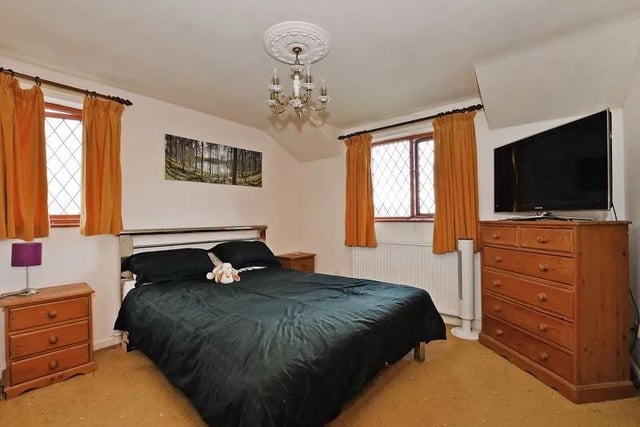 This large bedroom has plenty of space for a double bed and more furniture. It will work brilliantly for a couple.