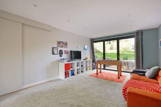 The family room is a terrific space and can offer access to the back garden patio.