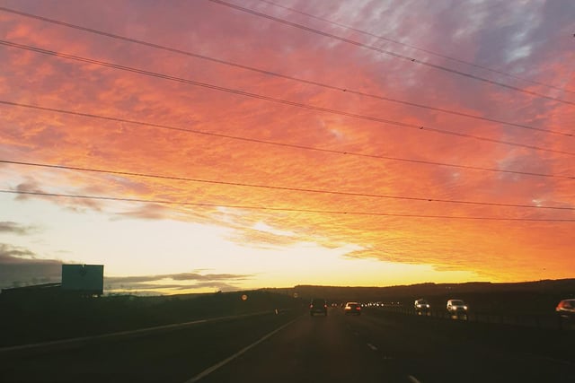 A gradual crescendo of dramatic orange and reds filled the sky as drivers watched from the motorway at Newcraighall.
