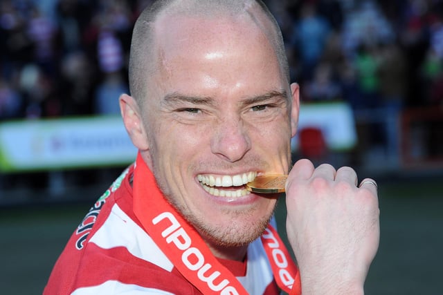 Loanee Iain Hume with his champions' medal