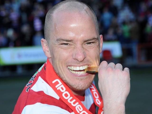 Loanee Iain Hume with his champions' medal