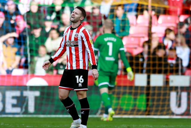Oliver Norwood of Sheffield United shows his frustration after Norwich's second goal at Bramall Lane: Simon Bellis / Sportimage