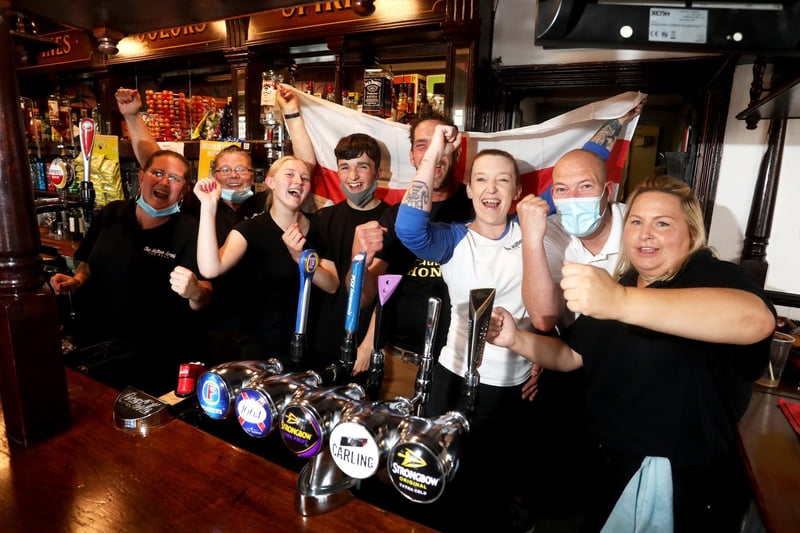 England fans pictured at the Milton Arms in Portsmouth, UK, about to watch England play on TV in the Semi-finals at Wembley. Pictured is the pub staff. Picture: Sam Stephenson
