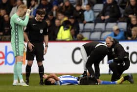 Another injury worry for Sheffield Wednesday as Reece James had to leave the field injured during the first half. (Steve Ellis)