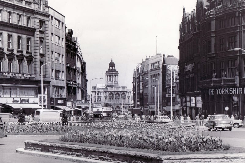Traffic islands turned into flower beds  in the centre of the city and this one is near the Goodwin Fountain at the junction of Surrey Street, Fargate, Leopold Street, Barkers Pool and Pinstone Street - 23 May 1962