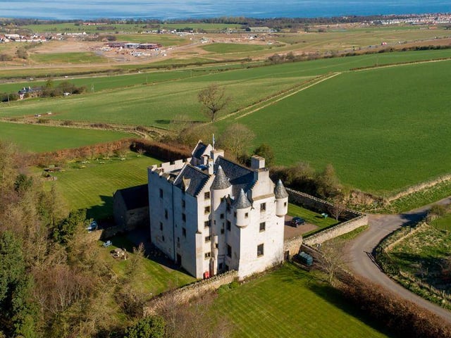 Within the grounds of the castle is a 17th century barn that was converted into two cottages, Woodside and Gateside. Adjoined to Gateside is a garage with workshop and snooker room.
