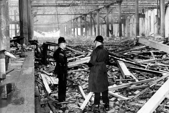 Pictured inside the Wicker Goods Yard after a devastating fire on July 31, 1966. Flames licked 70 feet in the air and a column of dense smoke, described by a witness more than a mile away as "resembling a miniature atom bomb mushroom," rose hundreds of feet. Four firemen were injured when part of the shed roof collapsed.