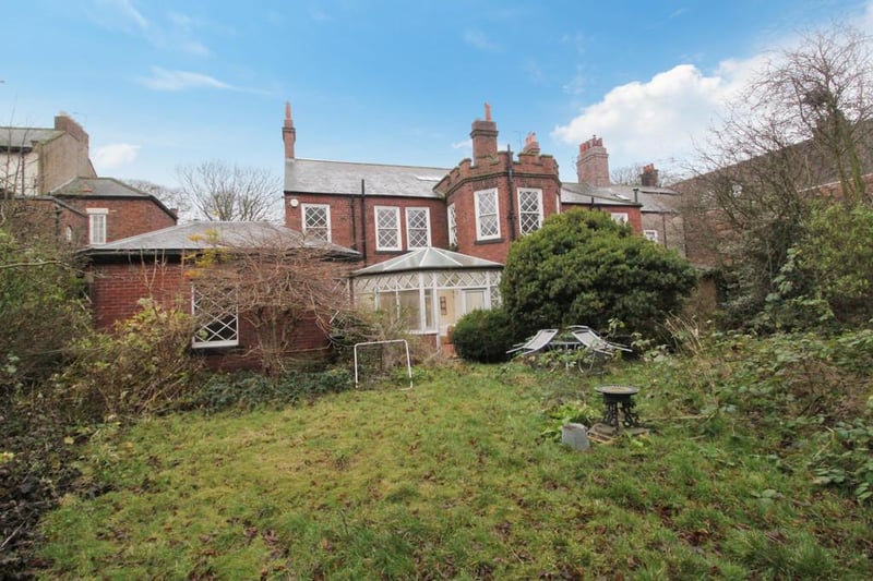A sliding timber gate in the back yard leads to a hard standing parking area providing access to Horsley Hill Road.

Photo: Rightmove