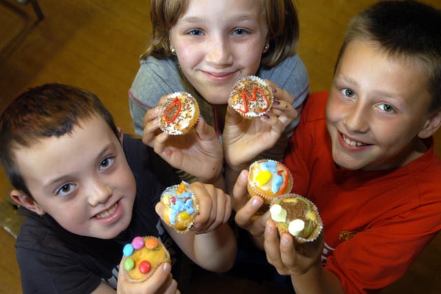 Children show off their decorated cakes at the Elms Holiday Club, hosted by St Peter and St Paul Church Hall in Hucknall.