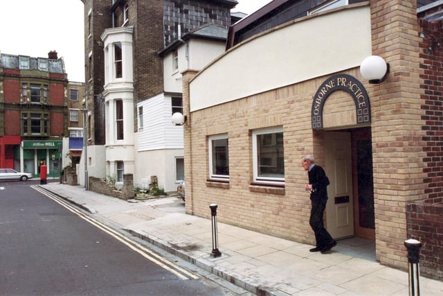 A person leaves the newly opened Osborne Road Practice in July 1992. There is still a doctor's surgery in Osborne Road in 2020 but it is now the Trafalgar Medical Practice. You can also the green-fronted William Hill bookmakers.