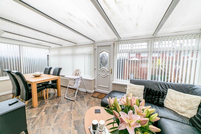 This conservatory is open plan and boasts plenty of light.