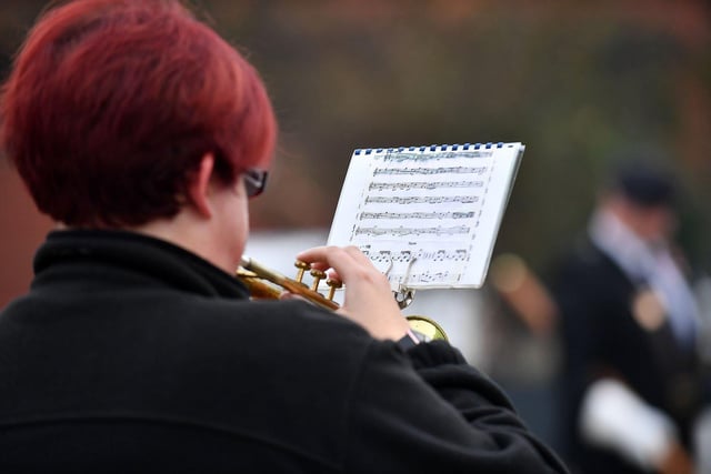 Victoria Coates, a bugler from Hartlepool Youth and Community Silver Band, playing the last post at the wreath laying.