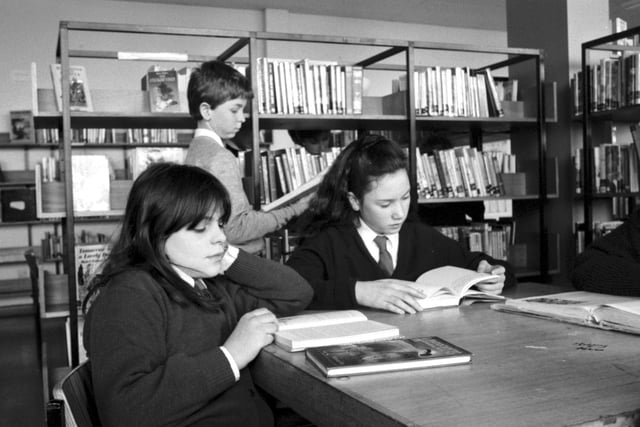 Children reading quietly in the school library at St Augustine's RC secondary school in Edinburgh, January 1990.