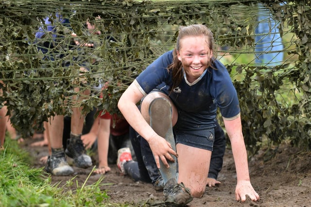 A High Tunstall College of Science pupil taking party in the muddy challenge event. Remember this?