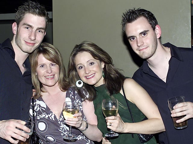 Stephen and Richard jump on the photo with Kathryn and Emma