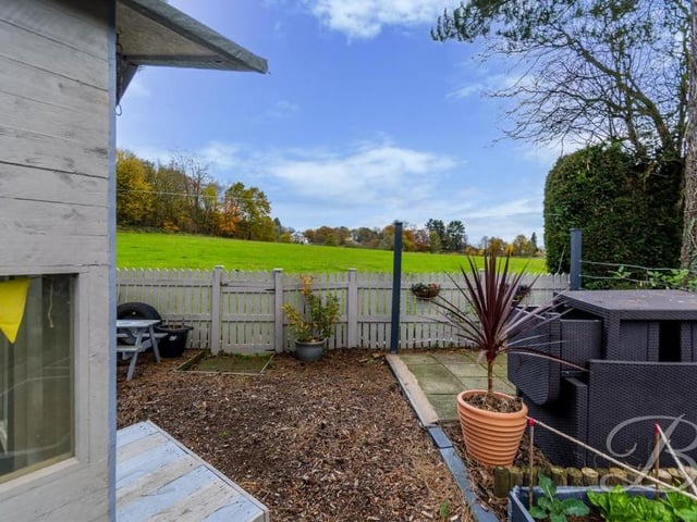 A final shot from the attractive garden shows how close the Caudwell Drive house is to Mansfield's rolling countryside.