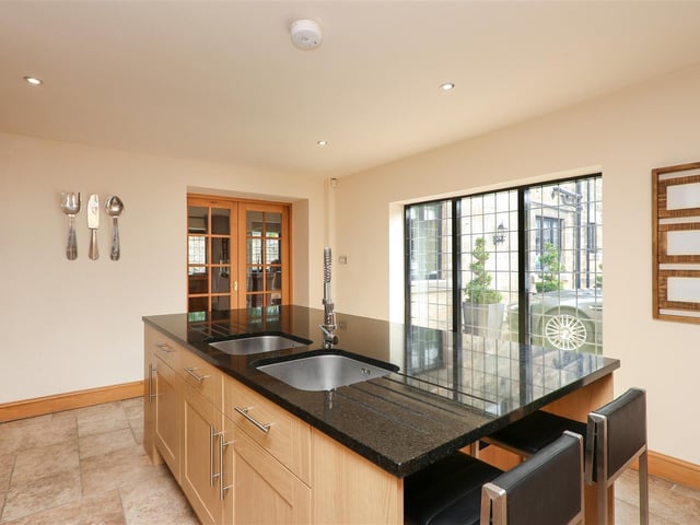 The kitchen has tons of natural light and a large island.