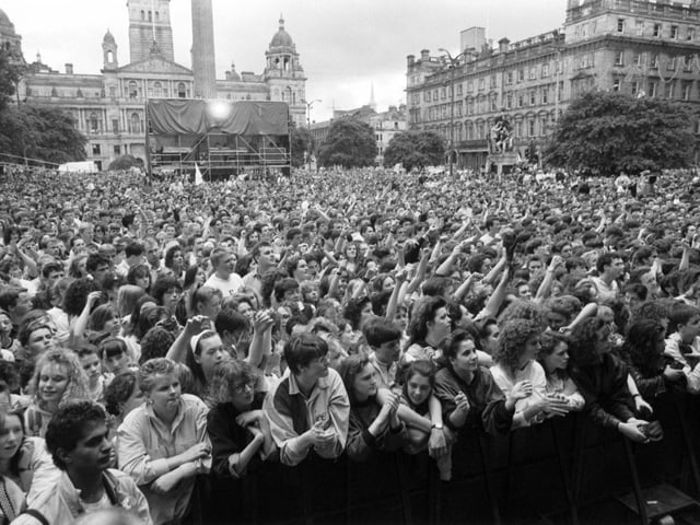 A crowd of 50,000 music fans gathered in George Square for the Glasgow's Big Day concert in June 1990.
