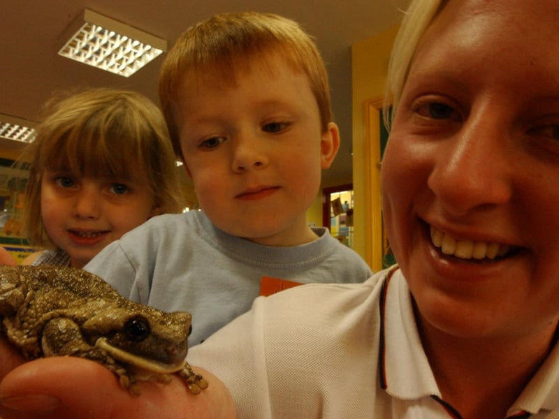 Becky Jackson from Zoolab showed pupils Kate Gordon and Elliott Gardener a peppered tree frog when she visited the Just Learning Nursery in Cleadon in 2003.