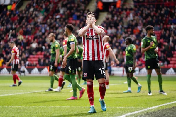 Sheffield United's John Egan stands dejected after a shot goes over the bar against Bournemouth: Zac Goodwin/PA Wire.
