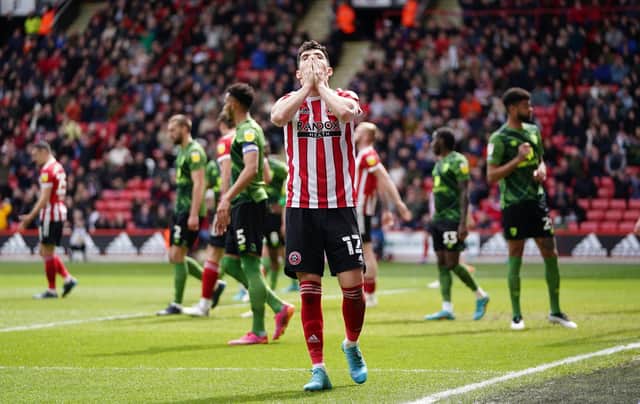 Sheffield United's John Egan stands dejected after a shot goes over the bar against Bournemouth: Zac Goodwin/PA Wire.