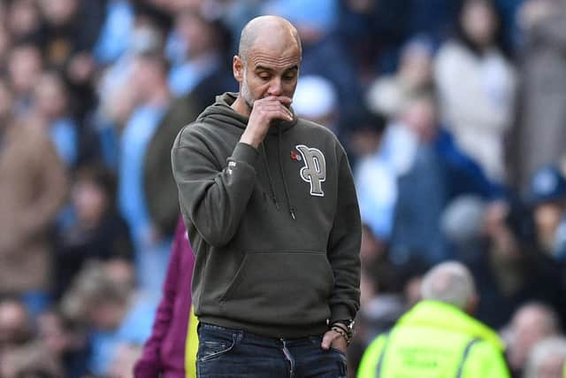 Manchester City's manager Pep Guardiola: OLI SCARFF/AFP via Getty Images