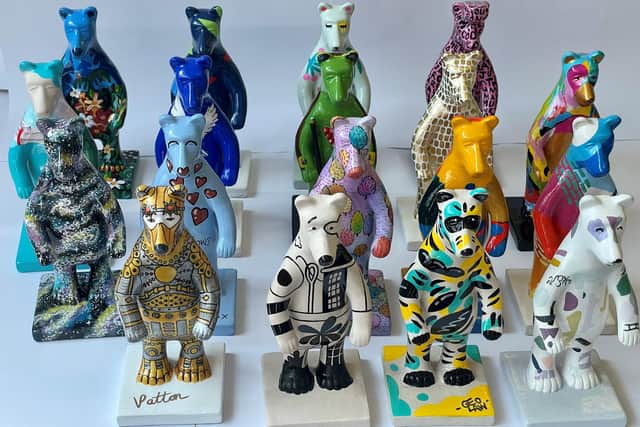 Some of the miniature Bears of Sheffield statues. The Pete McKee bear is on the second row, second from left.