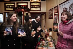 Author Glenda Young meets fans Charlotte Stead, Amy Griffiths, Colin and Harrison Powell at her new book launch at Central Tramway