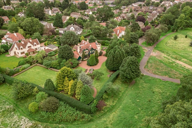 This is an aerial picture of the property showing off the size of the landscaped gardens
