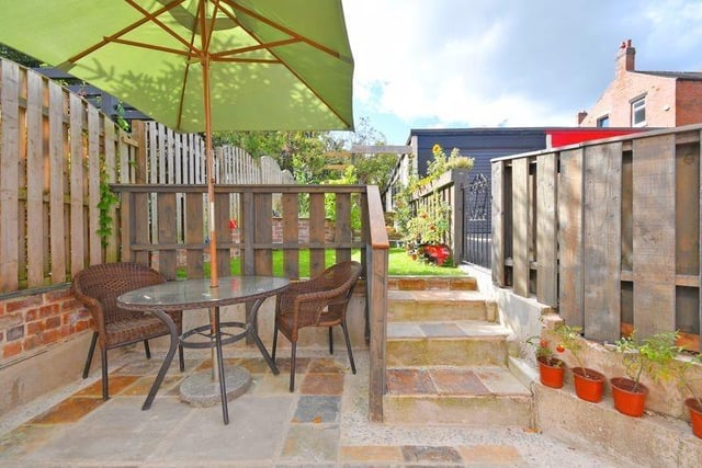 Just beyond the rear extension is this lovely patio and garden.