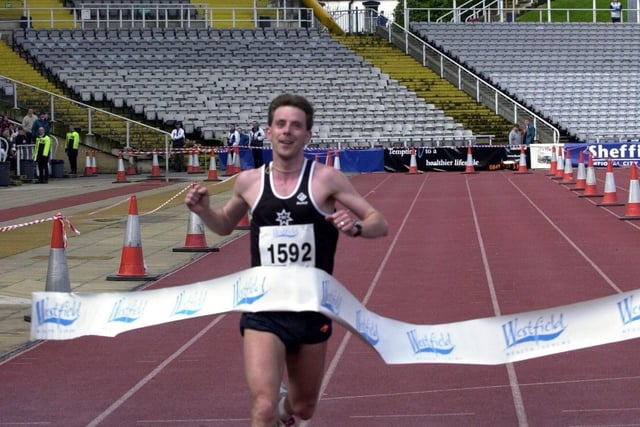 Sheffield marathon, Don Valley Stadium, Sheffield. Rotherham Harriers runner Andrew Aked comes in first in the half marathon in 2001