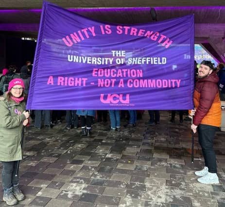 A banner showing support at a student-staff rally on the Sheffield Student's Union concourse