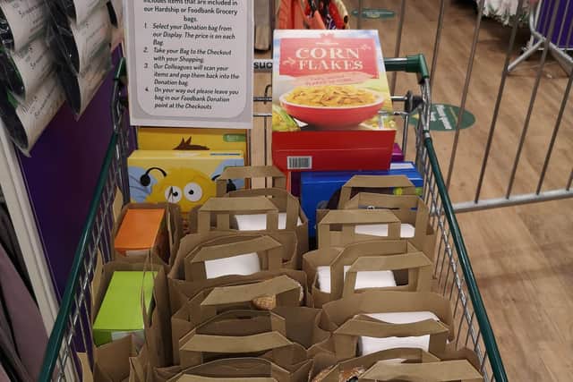 Donations and 'food bank basics' bags ready to be delivered from Morrisons Hillsborough