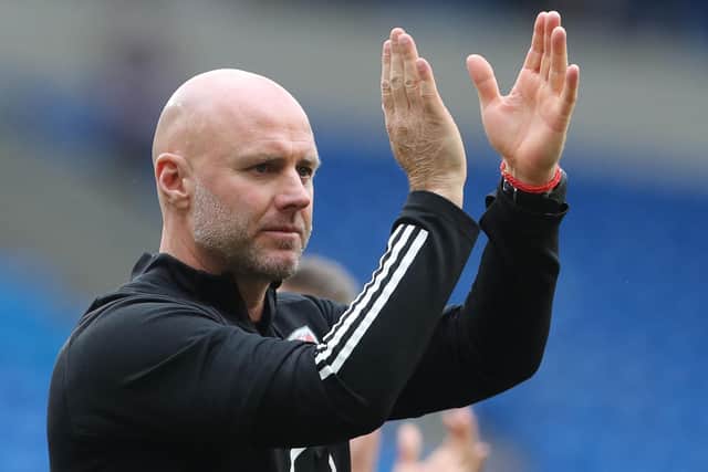 Wales' interim head coach Rob Page applauds the fans at the end of the international friendly football match between Wales and Albania at Cardiff City Stadium in Cardiff, South Wales, on June 5, 2021. (Photo by GEOFF CADDICK/AFP via Getty Images)