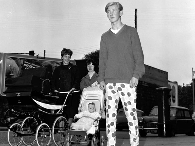 Peter Tuffy walks along Dalry Road Edinburgh in his new spotted jeans in 1963.