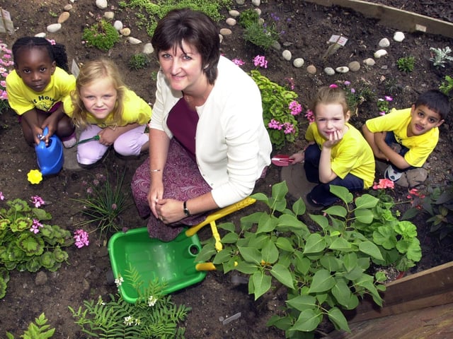 Holt House School headteacher Jane Clay with pupils at the new sensory garden created to celebrate the school's 50th anniversary in 2003