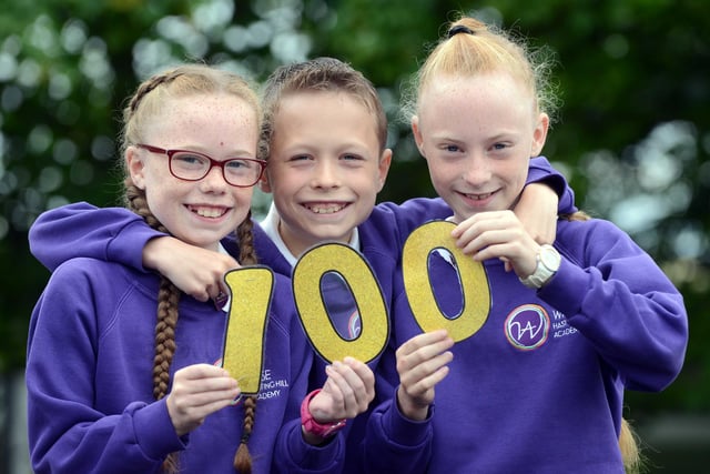 Hastings Hill Academy triplets Imogen, Michael and Mill Laing, 11, had a 100 per cent attendance record in 2017.